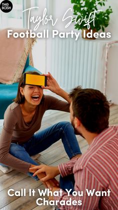 a man sitting on the floor next to a woman wearing a virtual reality headset