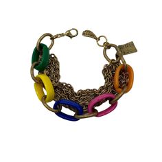 "Vintage 1970's chain link bracelet by Yochi NY. Deadstock bracelet has rainbow plastic links with three gold tone chains. It has a lobster clasp and measures 10\" long. It has its original $20 price tag. Unworn condition. Please see photos for more details. All items are vintage that are preowned. All of the items may show some form of wear due to their age. Please kindly remember that these items are anywhere from 30-80 years old. I make every attempt to clearly describe the item, including an Retro Multicolor Metal Bracelets, Bakelite Bracelets, Link Chain Bracelet, New Green, 80 Years, Price Tag, Chain Link Bracelet, Vintage Boutique, Link Chain