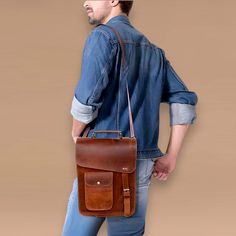 If you're searching for a bag that's more than just an accessory, our Vintage Leather Messenger Bag is here to elevate your style game. Handcrafted from full-grain leather, this satchel isn't just about carrying your essentials - it's about making a statement wherever life takes you. Why You'll Fall in Love with This Leather Messenger Bag: Genuine Full-Grain Leather: This isn't your average bag. Made from the finest full-grain leather, it's designed to age gracefully, developing a unique patina Vintage Leather Messenger Bag, Leather Messenger Bag Laptop, Laptop Messenger Bags, Crossbody Satchel, Vintage Leather Bag, Leather Messenger Bag, Vintage Casual, Leather Messenger, Distressed Leather