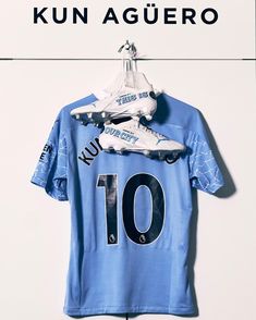 a soccer jersey with the number ten on it and two roller skates attached to it