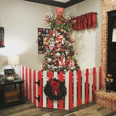 a christmas tree decorated with red and white stripes