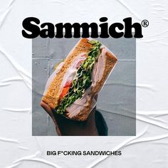 a sandwich with meat, lettuce and tomato on it