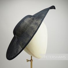 Get Royal Ascot ready with this extra large pointed tip sinamay fascinator base! Made from a triple layer of stiffened sinamay millinery fabric and is ideal for making an instant hat. This shape has a lovely pointed tip and a shallow crown. Get creative by positioning it at different angles on the head! Just add a headband for securing to the head (not included but available in our shop!) *This is not a fitted hat! You will need to sew in a headband or comb to attach it to your head* Measurement Sinamay Fascinator With Curved Brim For Royal Ascot, Brimmed Sinamay Fascinator For Church, Fitted Sinamay Straw Hat With Curved Brim, Fitted Sinamay Boater Hat With Curved Brim, Fitted Sinamay Fascinator For Church, Canterbury England, Sinamay Fascinator, Church Clothes, Blank Hats