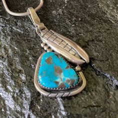 Beautiful Navajo Pearls Maize Corn Pendant With A Raised Turquoise Stone In A Serratedn Bezel Setting Framed With Cut Edges. Navajo Sterling Pearls And A Corn Stalk. Handcrafted By Native American Navajo Wilson Padilla. Nice Sized Bale For A Chain, Leather Or Choker. Great Traditional Maize Design. Corn, Symbol Of Substance And Source Of Native Legends Wilson Padilla’s Excellent Craftsmanship Is Featured In Several Museums. Price Is For Pendant Only Stamped Sterling Hallmark Wilson Padilla 13.41 Southwestern Blue Turquoise Inlay Necklace, Traditional Blue Turquoise Necklace With Inlay, Traditional Blue Turquoise Necklace In Sterling Silver, Navajo Pearls, Navajo Turquoise, Maize, Turquoise Pendant, Turquoise Stone, Bezel Setting