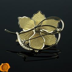 "Exquisite modern Baltic amber floral brooch featuring perfectly rounded 13mm cognac amber bead set in 18K gold plated flower delicately surrounded with Swarovski crystals. DIMENSIONS: Length: EU 65mm / US 2.5\" Width: EU 50mm / US 1.9\" Weight : 10g / 0.35 oz Clasp Type: Modern C type catch/release pin Dispatch Time: Same Business Day DISCOVER MORE AMBER BROOCHES: https://www.etsy.com/ie/shop/PreciousAmber/items?ref=pagination&section_id=20094956 Thank you for visiting, I hope you will find Olive Earrings, Jewelry Brooch, Floral Brooch, Gold Brooch, Bead Set, Amber Beads, Flower Plates, Gold Brooches, String Bracelet