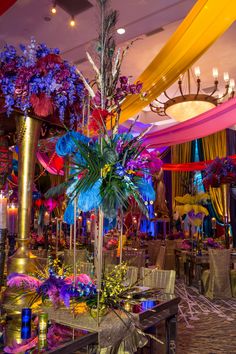 an elaborately decorated dining room with colorful decorations