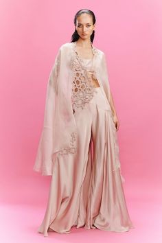 Peach organza cape with lace embroidery. Comes with satin draped sharara and a bustier. - Aza Fashions Peach Sharara, Dolly J, Bridal 2024, Draped Pants, Organza Cape, Cape Set, Lace Cape, Drape Pants, Contemporary Dresses