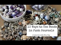 a bowl full of beads sitting on top of a table next to a pile of other items