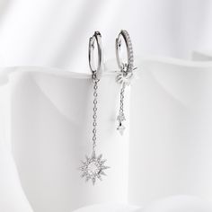 Sunlit Drop Silver Earrings Sterling Silver Huggie Earrings With Dangling Charms As Gift, Silver Dangle Hoop Earrings With Charms, Silver Charm Earrings For Everyday, Trendy Silver Earrings With Charms, Trendy Sterling Silver Dangle Huggie Earrings, Silver Drop Earrings With Dangling Charms, Silver Dangle Huggie Earrings With Charms, Silver Sterling Huggie Earrings With Dangling Charms, Sterling Silver Drop Earrings With Charms