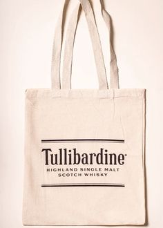 a white tote bag with the words tullibarddinee printed on it