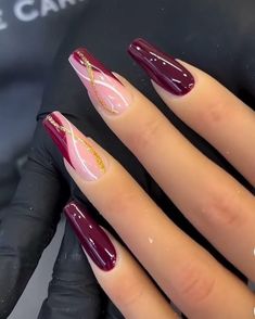 When it comes to burgundy chrome nails, there are so many design possibilities to choose from. Whether you prefer simple, elegant nails or something more detailed and artistic, the options are endless. Burgundy chrome gives off a high-shine, almost mirror-like effect that’s perfect for showcasing your nail art.  Some popular designs include adding intricate details like metallic stripes, tiny rhinestones, or subtle glitter accents. You can also try geometric patterns or mix in other colors like Fall Nail Inspo Burgundy, Nails 2024 Burgundy, Graduation Nails Burgundy, Coffin Chrome Nails Designs, Birthday Nails Burgundy, Magenta Nail Art Design, Fall Acrylic Nails Burgundy, Fall Nail Ideas With Glitter, Gold And Burgundy Nail Designs