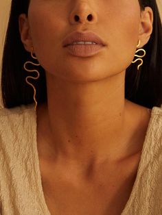 Asymmetrical duo snake earrings ethic jewelry statement | Etsy Gold Snake-shaped Earrings With Pierced Ears, Gold Snake-shaped Jewelry With Pierced Ears, Gold Snake Jewelry For Pierced Ears, Gold Snake Shape Single Earring, Handmade Gold Snake Earrings, Nickel-free Gold Snake Jewelry, Desert Jewelry, Gold Snake Earrings, Dangerous Creatures