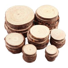 several pieces of wood stacked on top of each other with the tops cut off to look like rings