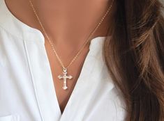 "CROSS NECKLACE FOR WOMEN - CHRISTIAN NECKLACE This Cross Necklace is made from 14K gold filled or sterling silver and comes with your choice of three different chains. Description: ✦ Your choice of 14K Gold Filled or Sterling Silver Chains ✦ Gold Filled or Sterling Silver Cross - 27mm x 15.5mm  ✦ Necklace is shown at 17\"  WHY YOU'LL LOVE IT * Because handmade = made with love, care, and thought. * Ethically Sourced * Comes beautifully gift boxed * Crafted with care from sunny South Florida.  HAPPINESS GUARANTEE: We stand by our jewelry and want you to love it too! GIFTS 🎁 All orders are sent packaged in a jewelry box - ready to be gifted! Upon request, we can also include a note card with your own personal message. * In an effort to be greener and to keep shipping costs down, your order Personalized Elegant Crucifix Cross Necklace, Elegant Personalized Crucifix Necklace, Elegant Personalized Cross Jewelry, Elegant Personalized Cross Necklace, Personalized Elegant Cross Necklace, Elegant Personalized Crucifix Jewelry, White Cross Necklace For Wedding With Cross Pendant, White Cross Pendant Necklace For Wedding, Elegant Crucifix Cross Necklace For First Communion