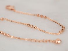 ♦ Handmade, high-quality item! ♦ Material: 14K Solid Rose Gold (18K Solid Rose gold is available to order) ♦Finish: High Polishing Finish ♦ Bracelet Length: 17.5cm + Adjustable chain 1.5cm (the listing photo) All of our jewelry is made to order, please allow the time for the production.