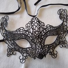 Add Some Allure And Mystique To An Elegant Outfit With This Beautiful Masquerade Mask From Italy! Purchased In Italy. Made In Italy. This Would Work Great For A Masquerade Party, Dance, Or For A Mardi Gras Party. It Has Never Been Worn, And Is In Beautiful Condition. Some Of The Black Material On The Mask May Have Tiny Areas Where It Is Fraying In A Couple Areas But That Is Hardly Noticeable At All. Each Ribbon Is About 16 Inches Long, But Could Be Cut Shorter, If Desired. Please See Photos & Fe Fitted Black Masquerade Mask For Carnival, Louis Vuitton Face Mask, Sequin Mask, Bridal Mask, Skull Face Mask, Feather Mask, Designer Face Mask, White Face Mask, Mardi Gras Party