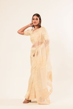 Indulge in the fusion of tradition and modernity with our White Organza Embroidered Saree. This premium saree boasts a soft, sheer texture and lightweight fabric for all-day comfort and effortless grace. Baluchari Saree, Silver Blouse, Saree Blouse Styles, Sequin Saree, Orange Saree, Net Blouses, Cotton Gowns, White Saree, Multi Color Blouse