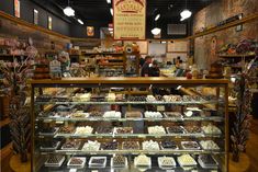 a bakery filled with lots of cakes and desserts