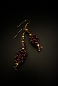 Garnet Beads_ Style: Grape Cluster_ Design Earrings with French wires Formal Beaded Drop Earrings, Formal Beaded Dangle Earrings, Handmade Briolette Earrings For Formal Occasions, Elegant Dangle Earrings With Polished Beads, Elegant Round Beaded Earrings For Celebration, Evening Beaded Earrings With Round Beads, Traditional Gold Earrings With Faceted Beads, Handmade Elegant Czech Glass Crystal Earrings, Elegant Gold Beaded Earrings With Faceted Beads