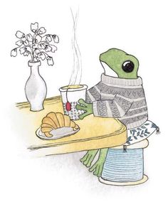 a drawing of a frog sitting at a table with coffee and croissants