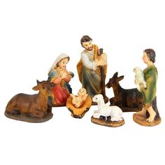 a nativity scene with figurines of people and animals