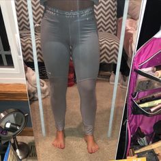 Nike Pro Leggings Never Worn Metallic Sporty Leggings For Gym, Sporty Metallic Leggings For Sports, Metallic Athleisure Leggings For Gym, Sporty Metallic Activewear For Sports, Metallic Athleisure Bottoms For Workout, Metallic Athleisure Bottoms For Sports, Sporty Metallic Fitted Bottoms, Fitted Silver Activewear For Sports, Silver Fitted Activewear For Sports