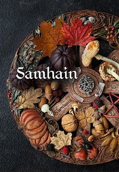 a wooden bowl filled with different types of autumn items