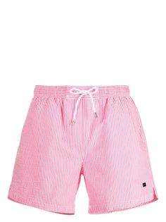 hot pink seersucker texture candy stripe print logo plaque elasticated drawstring waistband rear welt pocket straight hem knee-length Be mindful to try on swimwear over your own garments. Pink Shorts For Spring Poolside, Pink Shorts For Pool In Spring, Striped Swim Trunks For Beachwear, Striped Swim Trunks For Swimming, Striped Swim Trunks For Swimming Beachwear, Summer Beach Seersucker Bottoms, Pink Beachwear Shorts For Pool, Pink Beachwear Swim Trunks With Built-in Shorts, Pink Sporty Shorts For Poolside