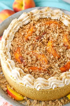 a cake with crumbs and fruit on top