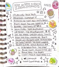 a handwritten playlist for kids is shown in a notebook