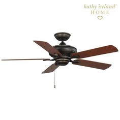 a ceiling fan with two brown blades on it's blades and the words, kathy ireland home