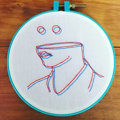 a embroidery project with a woman's face on it