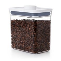 a glass container filled with coffee beans