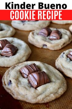 chocolate chip cookies are on a baking sheet with the words kinder blueo cookie recipe