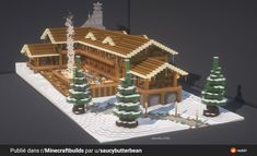 a house made out of legos is shown in the snow with trees and bushes