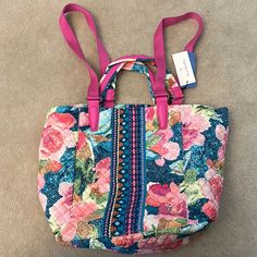 Bright Floral Pattern, Hidden Charger Pocket, 2 Inner Zip Pockets, Multiple Straps That Can Be Worn On The Shoulder Or In Your Hand. Measures 19”Wx12.5”Lx8.25”D Open Top With Metal Hook Closure Trendy Floral Print Bags For Vacation, Floral Print Summer Bags, Casual Multicolor Floral Print Bag, Multicolor Floral Print Vacation Bags, Bohemian Floral Print Bags For Vacation, Casual Floral Print Bags For Vacation, Spring Floral Print Fabric Bag, Bohemian Multicolor Floral Print Bag, Yellow Purses