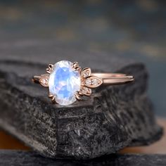 "Oval Cut Moonstone Engagement Ring Rose Gold Vine Leaf Three Stone Bridal Wedding Women Antique Ring Anniversary Birthstone June Rainbow Same Design with different gemstone: https://www.etsy.com/listing/628098692 https://www.etsy.com/listing/628231157 Interested in bridal set, check here: https://www.etsy.com/listing/731143644 ITEM INFORMATION Metal Type - Solid 14k Rose Gold Band Width - (approx. 1.5mm) Center Stone - 6*8mm Natural Moonstone, Oval Cut Side Stone - Natural Diamond Weight - 0.1m Moonstone Engagement Ring Rose Gold, Blue Topaz Engagement Ring, Wedding Women, Moissanite Bridal Sets, Engagement Ring Rose Gold, Moonstone Engagement, Topaz Engagement Ring, Moonstone Engagement Ring, Sapphire Wedding