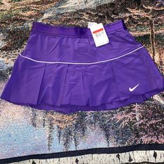 Women’s Nike Essential Victory Tennis Skirt W/ Shorts Cj1606-546 Purple Sz Large. Brand New With Tags 88% Polyester (100% Recycled), 12% Spandex Plain Jersey. True To Size Mid Rise Packages Are Usually Shipped Within 3 To 5 Business Days. Everything You See In The Photo You Will Get In The Same Condition You See It In. If You Got Any Questions Or Any Offers Shoot A Dm. Need More Pictures? Dm Me We Answer Within 12 Hours. Purple Tennis Skirt, Navy Tennis Skirt, Nike Tennis Skirt Outfit, Nike Skirt, Nike Tennis Skirt, Nike Skirts, Tennis Skirt Outfit, Athletic Skort, Pleated Tennis Skirt