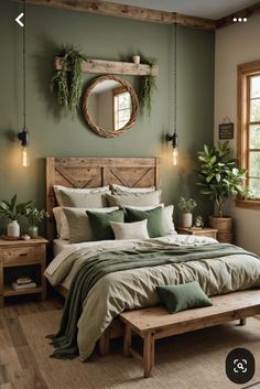 a bedroom with green walls and wooden bed frame, plants on the headboard, potted greenery hanging from the ceiling