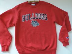 Vintage Gonzaga University Champion Athleticwear Sweatshirt. Gonzaga University is very well known for Basketball as well as Top Academics. The Bulldog's went to the NCAA Final Game in the National Championship in 2017. They have been contender's for NCAA March Madness every year since 1999. The Zag's have been to 22 NCAA Championship Tournaments.  Size S Please visit my Shop for Trendy Vintage Goods. https://www,etsy.com/shop/SevenSeven52Vintage Thank you so much!! Gonzaga University, Ncaa March Madness, Gonzaga Bulldogs, Ncaa Championship, Retro Sweatshirts, University Sweatshirts, Basketball Team, March Madness, Champion Sweatshirt