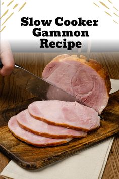 a person slicing ham on a cutting board with the words slow cooker gammon recipe