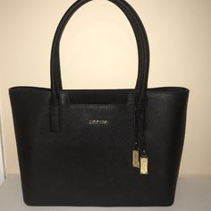 New Never Used. No Tags, Was A Present Black Calvin Klein Bag For Formal Occasions, Calvin Klein Black Formal Bag, Elegant Calvin Klein Shoulder Bag For Formal Occasions, Calvin Klein Black Shoulder Bag For Daily Use, Elegant Calvin Klein Bags For Office, Elegant Calvin Klein Bag For Formal Occasions, Classic Calvin Klein Office Bag, Elegant Calvin Klein Office Bag, Elegant Calvin Klein Formal Bag