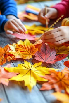 Children crafting colorful paper autumn leaves on a wooden table. Fun Diy Projects, Simple Craft Ideas, Leaf Structure, Pumpkin Uses