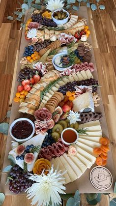 a long table covered in lots of different types of food