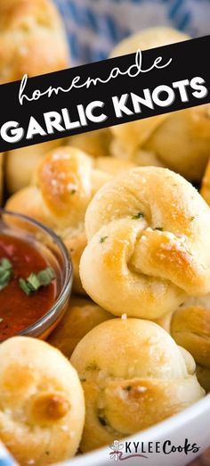 homemade garlic knots in a bowl with dipping sauce on the side and text overlay