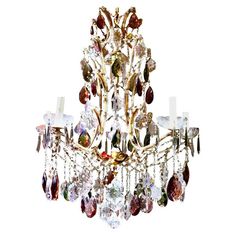 a chandelier with many crystal pieces hanging from it