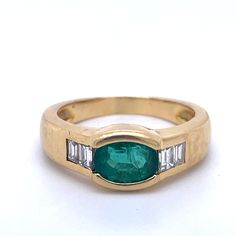 Vintage Emerald Ring, 1ct Oval Emerald, Chunky Ring, Emerald ring, bezel setting ring, Gold Vintage Ring, Estate Jewelry, Unisex men ringy Jewelry Yellow Gold 18k (the gold has been tested by a professional) Total Carat Weight: 1.25ct (Approx.) Total Metal Weight: 7.96 g Size: 8.25 US \ 18.35 mm Grading Results: Stone Type: Diamond Shape: Baguette Carat: 0.25ct (Approx.), Stones quantity:4 Color: F Clarity:VS Grading Results: Stone Type: Emerald Shape: Oval Carat: 1ct (Approx.), Stones quantity:1 Color:green Feel free to contact us for inquiries and consultation and special requests. The item will be shipped in a luxury box and bag ready as a gift - The shipment package is also ready as a gift - you can send your special item straight as a gift :) Certification included: Our shop certifica Classic Oval Emerald Ring With Bezel Setting, Timeless Oval Emerald Ring With Bezel Setting, Emerald Bezel Set Oval Cabochon Ring, Formal Rings With Bezel Setting And Oval Cabochon, Oval Channel Set Rings In Fine Jewelry, Oval Channel Set Rings Fine Jewelry, Oval Channel Set Fine Jewelry Rings, Classic Emerald Ring With Bezel Setting, Oval Cabochon, Classic Oval Emerald Ring With Tension Setting