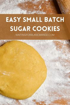 an easy small batch of sugar cookies on a wooden table with flour and rolling pin