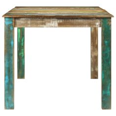 an old wooden table with green paint on the top and bottom, against a white background