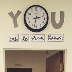 there is a clock on the wall that says you can do great things in front of it